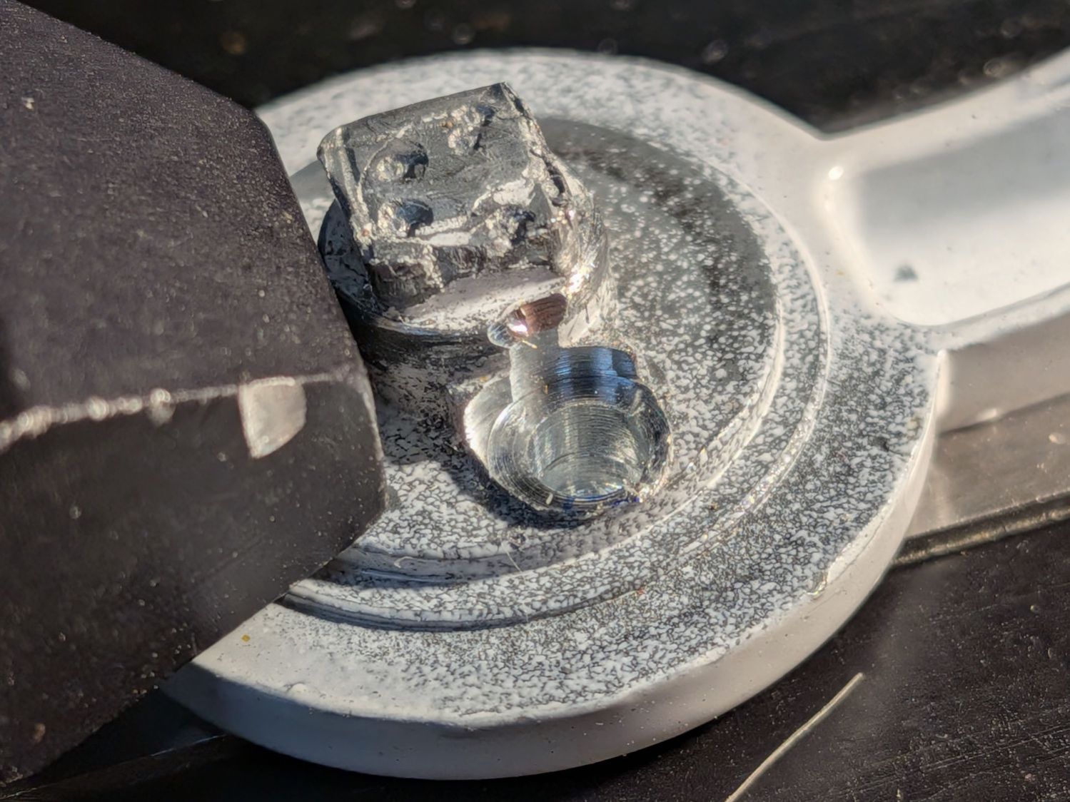 Window latch cam - milled hole